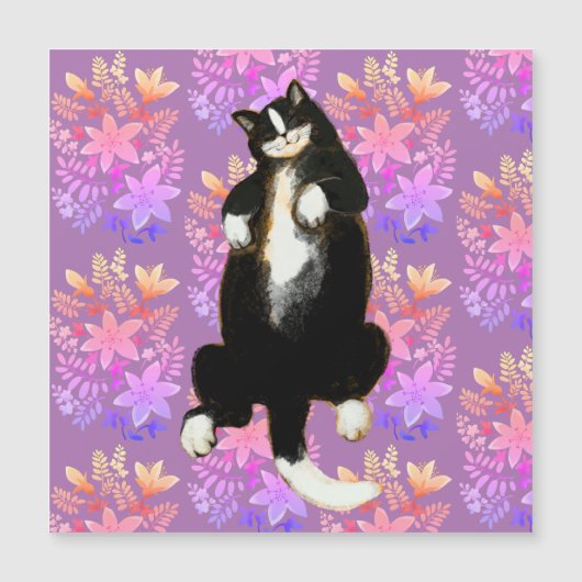 Tuxedo cat Sleeping on floral bed (Front)