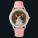 Tuxedo Cat With Staff Watch<br><div class="desc">Yep! April, the innocent-looking little cow-colored black and white kitten, has staff! She uses a hand resting on the mouse as a headrest. She visits the cat box as soon as it's been cleaned. She bumps her staff members with her head when she wants a treat. But we love her...</div>