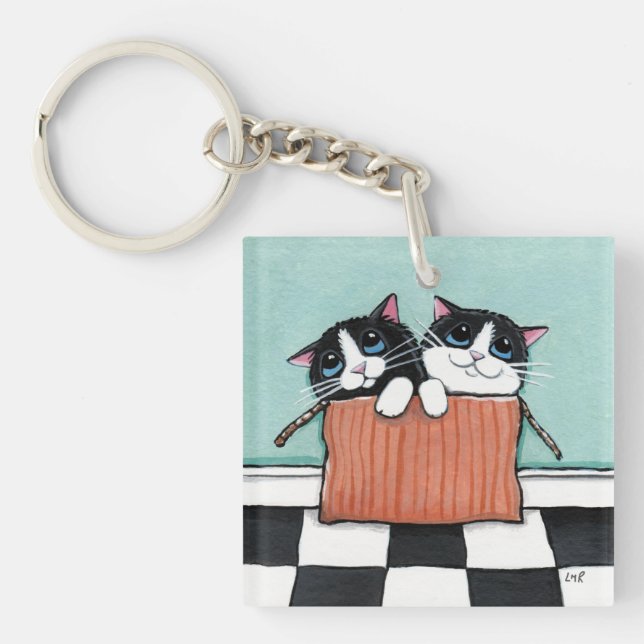 Tuxedo Kittens in a Cardboard Box Keychain (Front)