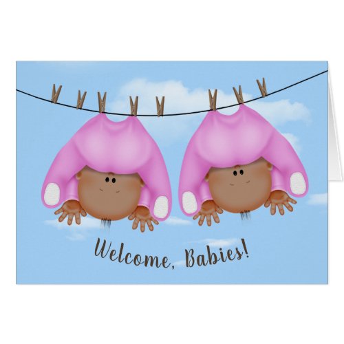 Twin Baby Girls On Clothesline