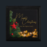 Twinkling Gold Lights Modern Merry Christmas Party Gift Box<br><div class="desc">This gorgeous Merry Christmas gift box features modern gold handwritten script over twinkling lights next to a festive Christmas tree that is decorated with red and green ornaments. Customize your elegant holiday presents with personalized script over the black night sky.</div>