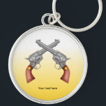 Two American Old West Pistols Crossed Keychain<br><div class="desc">Two old west hand guns crossed over each other. A fun hand gun illustration for lovers of classic, vintage Americana. I drew this gun from a creative commons photo, credit for this photo goes to Firstinduty. If you would like any help personalizing this product please feel free to contact me,...</div>
