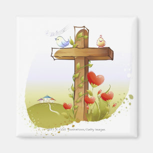 Two birds perching on a cross magnet
