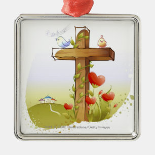 Two birds perching on a cross metal ornament