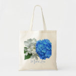 Two Blue Hydrangeas Personalized Name Tote<br><div class="desc">Blue hydrangeas personalized tote bag with name template.  A light blue flower and bright blue flower decorate one side of this cloth bag,  with options for handle color.  Or choose another style.</div>