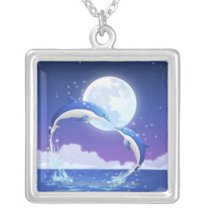 Two bottle-nosed dolphins jumping out of water silver plated necklace