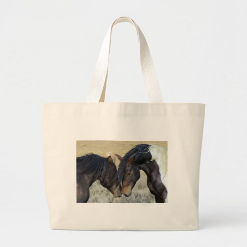 Two Brown Wild Horses Nuzzling Large Tote Bag