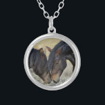 Two Brown Wild Horses Nuzzling Silver Plated Necklace<br><div class="desc">A pair of brown wild horses sharing a tender moment in a grassy field. These two brown paint horses can be seen gently nuzzling each other,  enjoying each others company. Their tousled manes blowing in the breeze. Displaying power,  kindness and freedom. Great for horse lovers.</div>
