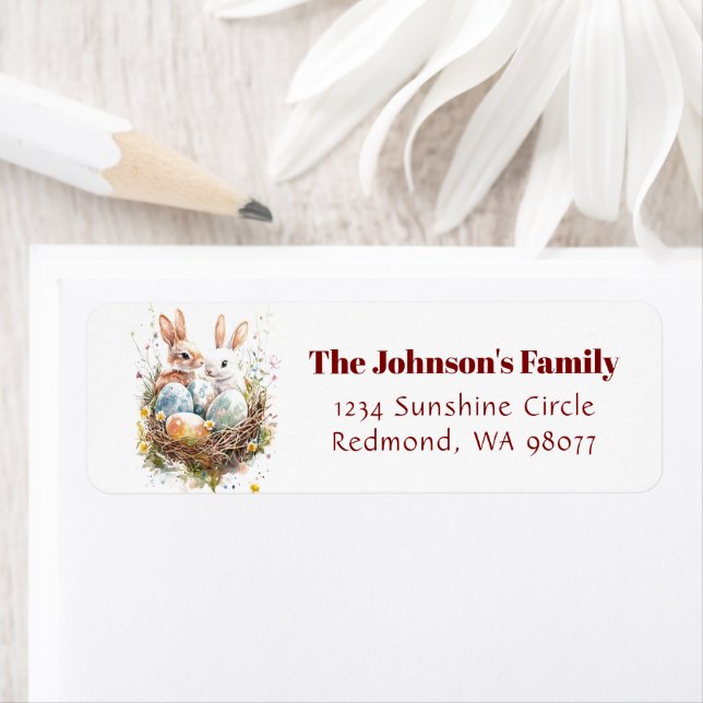 Two bunnies in nest with Easter eggs address Label (Insitu)