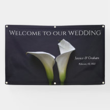 Two calla lilies on black wedding