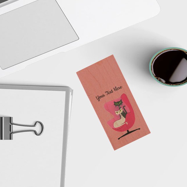 Two Cats Sitting in Mid Century Modern Pink Chair Wood Flash Drive (Black cat sitting with white cat in mid century modern pink chair on pale pink wood USB drive.)