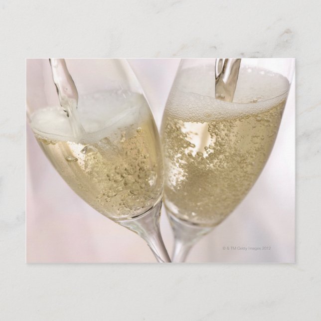 Two champagne flutes being filled with sparkling postcard (Front)