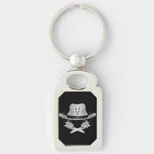 Two crossed guns and hat keychain