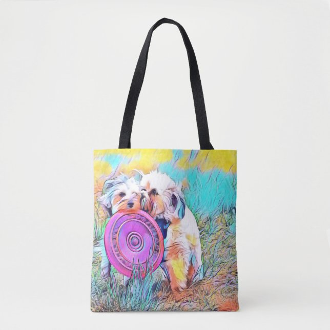 Two cute dogs playing frisbee tote (Front)
