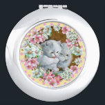 Two cute kittens - compact mirror<br><div class="desc">Two cute white cats and lots of delicate flowers in nice colors.</div>