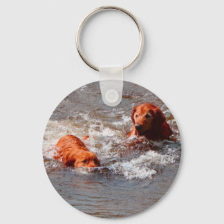 two dogs playing in the water keychain