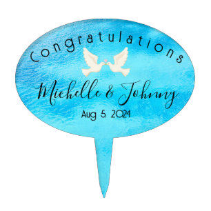 Two doves with pink heart on blue background cake topper