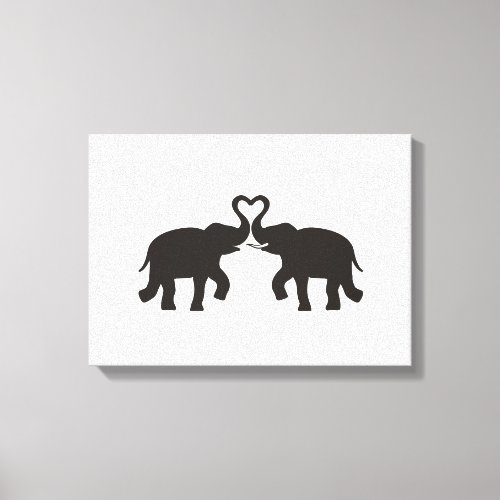 Two elephants love silhouettes canvas print