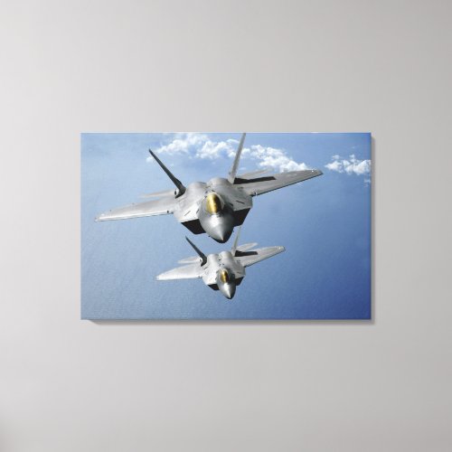 Two F_22 Raptors fly over the Pacific Ocean 2 Canvas Print