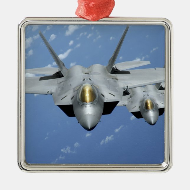 Two F-22 Raptors fly over the Pacific Ocean 2 Metal Ornament (Front)
