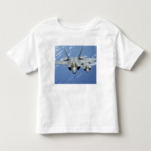 Two F_22 Raptors fly over the Pacific Ocean 2 Toddler T_shirt