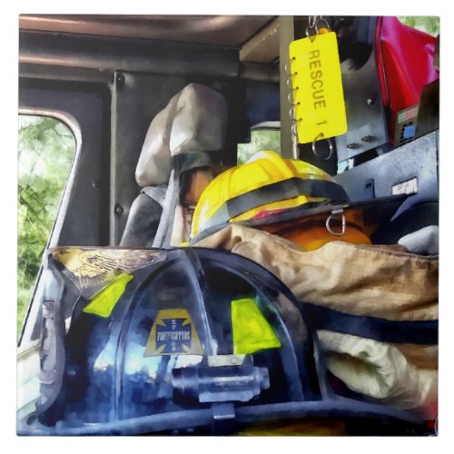 Two Firefighters Helmets Inside Fire Truck Tile