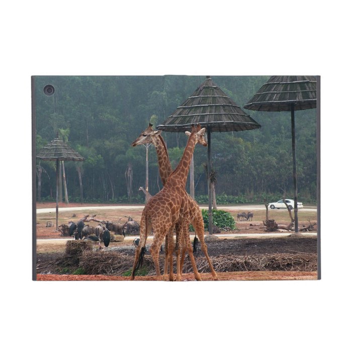 Two giraffes comforting each other in a zoo iPad mini cover