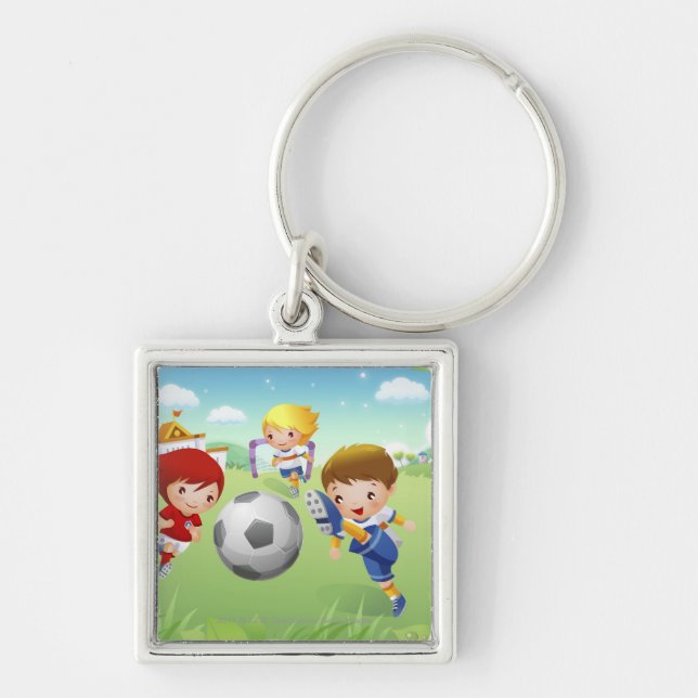 Two girls and a boy playing soccer keychain (Front)