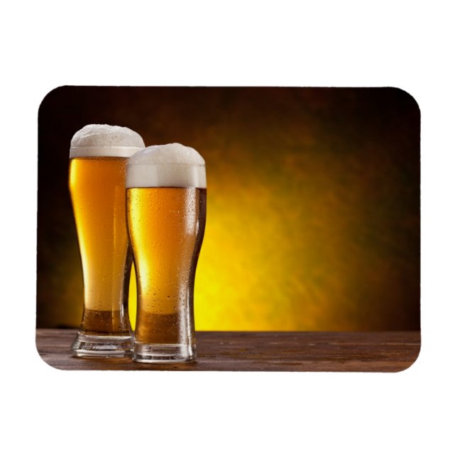 Two glasses of beers on a wooden table magnet (Horizontal)