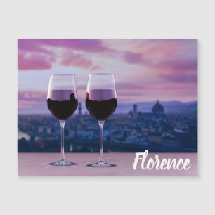 Two glasses of red wine on Florence skyline