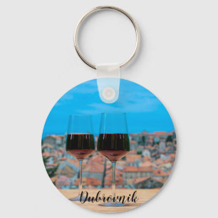 Two glasses of red wine with view of Dubrovnik Coa Keychain