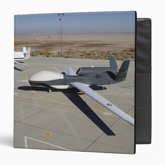 Two Global Hawks parked on a ramp Binder (Front/Inside)