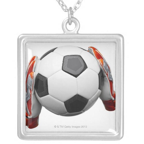 Two goal keepers gloves holding a football silver plated necklace