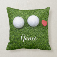 Two Golf balls and  love heart are on green grass Throw Pillow