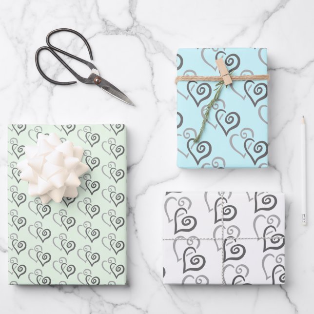 Two Gray Linked Hearts Pattern Wrapping Paper Sheets (Front)