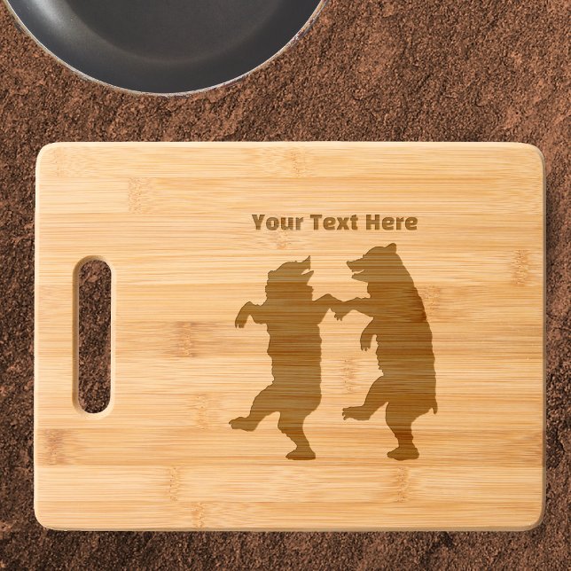 Two Happy Dancing Bears in Black silhouette Engraved Cutting Board (Two happy black bears in silhouette dancing together holding hands on bamboo cutting board.)