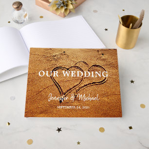 Two hearts in sand bride groom beach wedding guest book