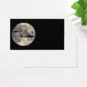 two helicopters silhouetted by a full moon (Desk)