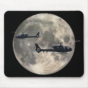 two helicopters silhouetted by a full moon mouse pad