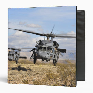 Two HH-60 Pavehawk helicopters preparing to lan 3 Ring Binder
