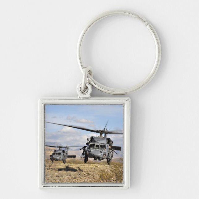 Two HH-60 Pavehawk helicopters preparing to lan Keychain (Front)