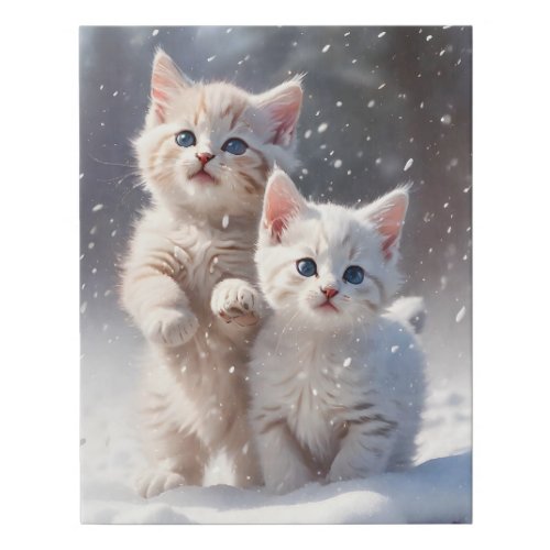 Two Kittens with Blue Eyes Playing in the Snow  Faux Canvas Print
