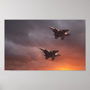 Two low flying F-15E Strike Eagles at sunset Poster