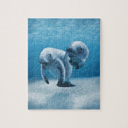 Two Manatees Swimming Jigsaw Puzzle