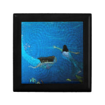 Two Mermaids Swimming