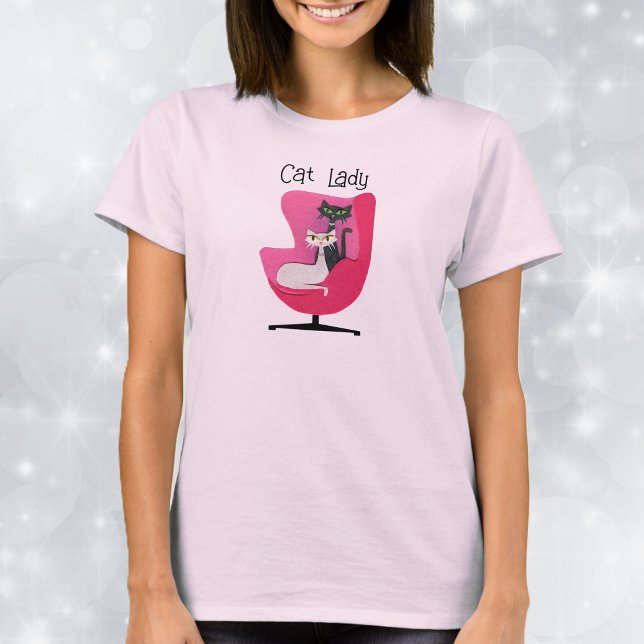 Two Mid Century Cats Sitting in Pink Chair T-Shirt (Two mid century cats sitting in pink chair with Cat Lady text on pink womans tee shirt.)