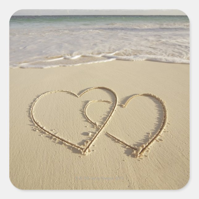 Two overlying hearts drawn on the beach square sticker (Front)