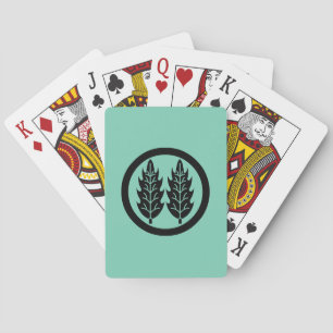 Two parallel holly leaves in circle poker cards