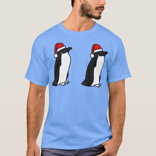 Two Penguins Wearing Christmas Santa Hats T_Shirt