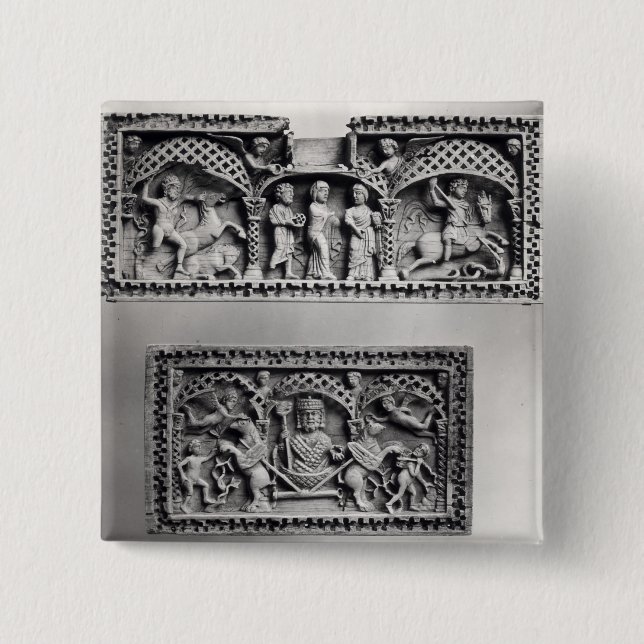 Two plaques from a chest pinback button (Front)